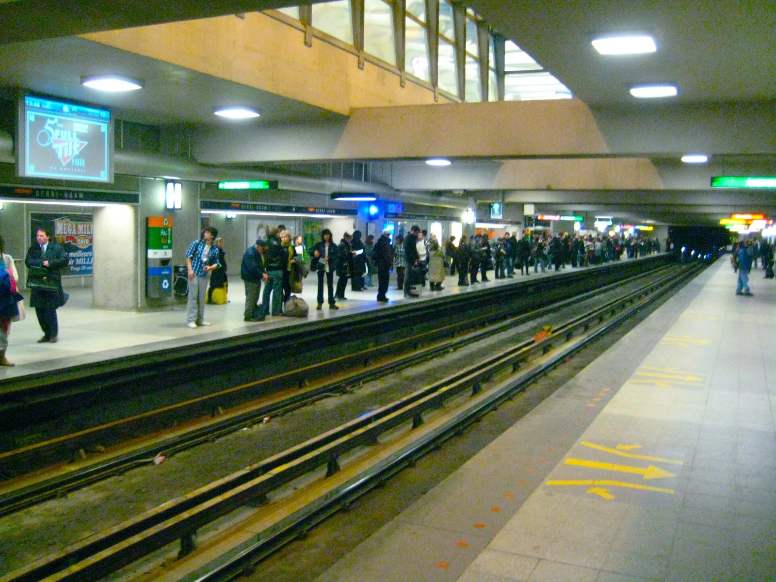 Passengers on the Orange line platform at Berri-UQAM, the key interchange for getting around Montreal