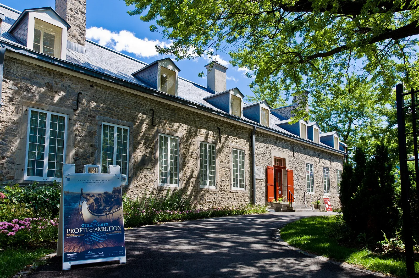 The long whitewashed stone front of Château Ramezay museum on rue Notre-Dame in Old Montreal