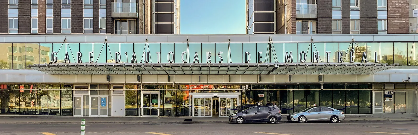 The glass front of the Gare d'autocars de Montréal bus terminal on rue Berri