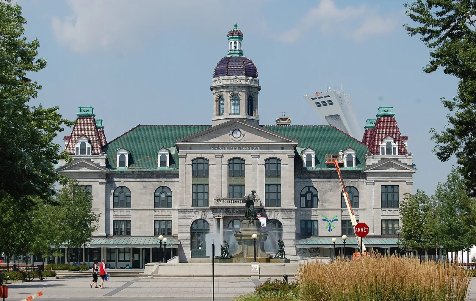 Beaux-Arts Marché Maisonneuve in Hochelaga-Maisonneuve with the Olympic Stadium tower behind