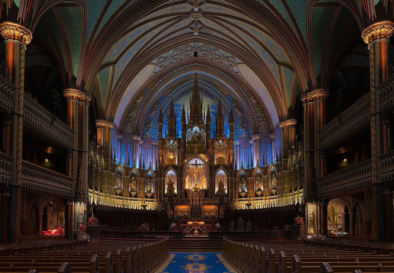 Gilded altar and blue vaulted ceiling of Notre-Dame Basilica, the most striking setting for Christmas in Montreal