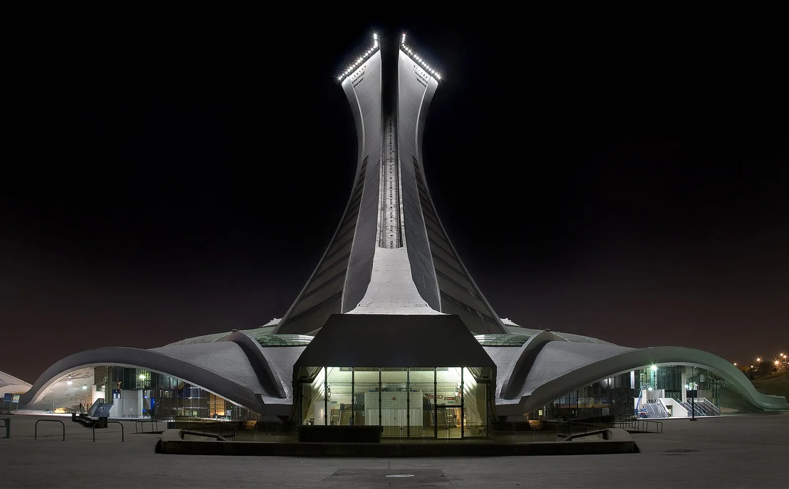The Olympic Stadium's inclined Montreal Tower lit up at night
