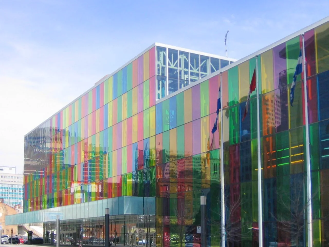 Multicoloured glass facade of the Palais des congrès de Montréal convention centre on a clear day