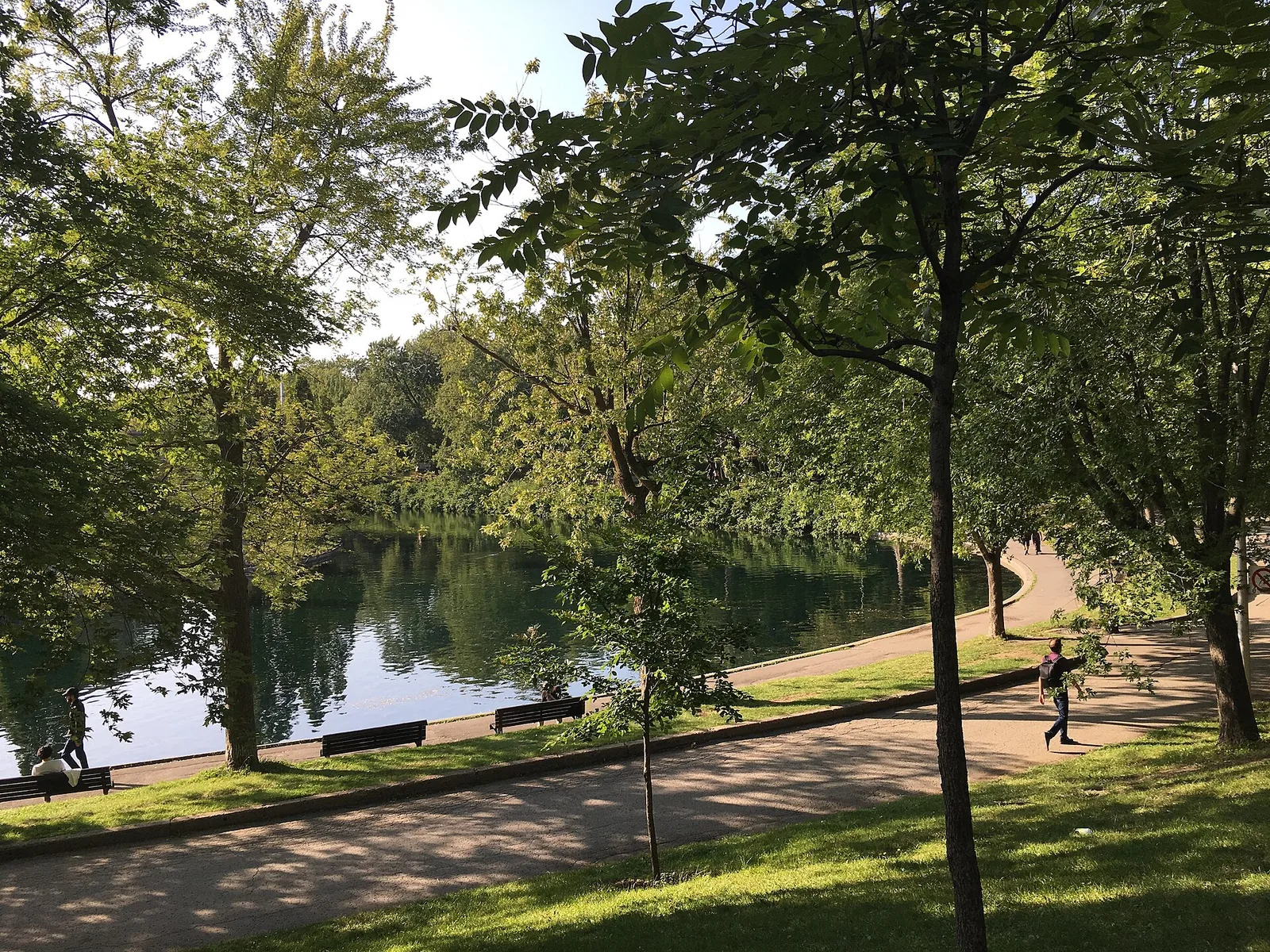 Parc La Fontaine's pond and shady paths in late August, the start of what many locals call the best time to visit Montreal