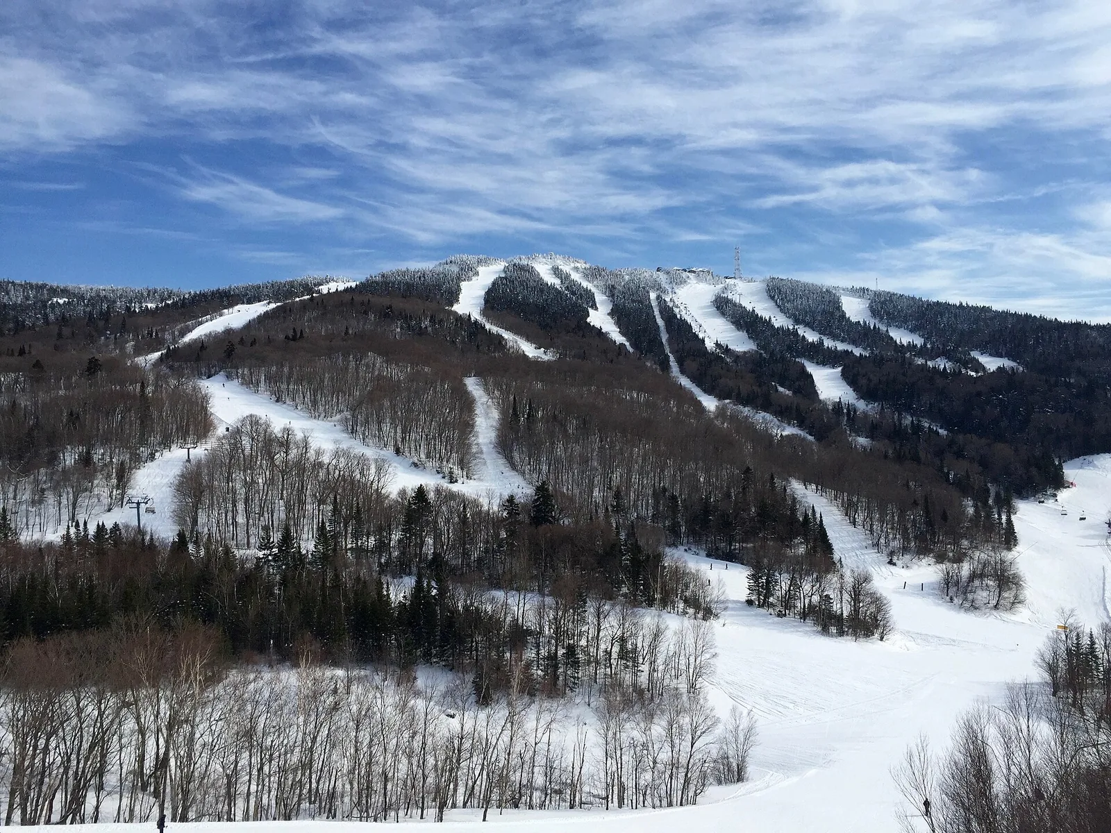 Snow-covered ski runs on the south side of Mont Tremblant, near the Scandinave Nordic spa in the Laurentians